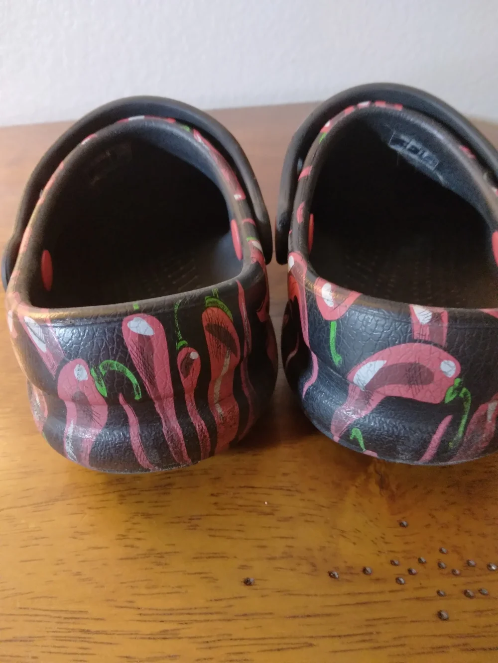 CROCS Kids Chili Pepoer Print Clogs in Black and Red